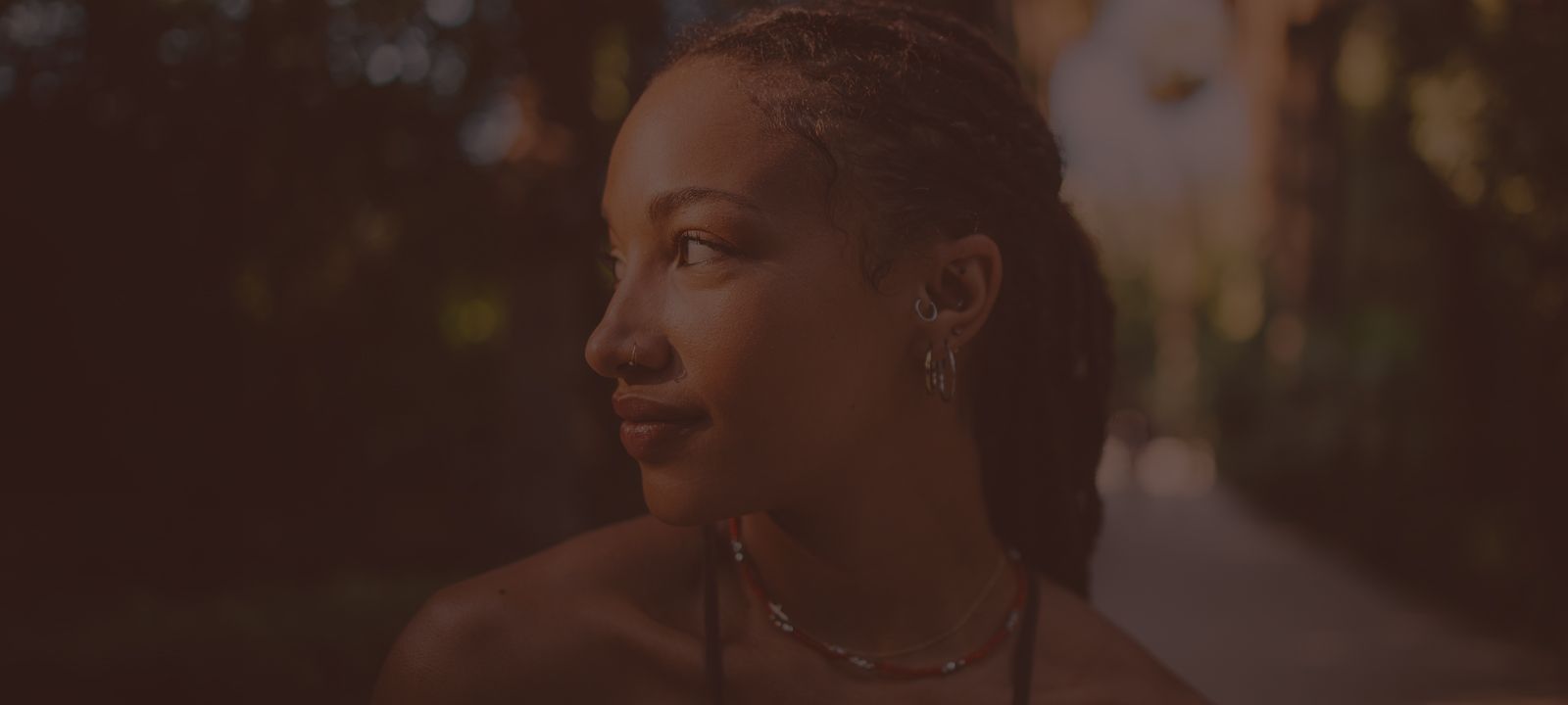 Profile of a young woman in natural light.