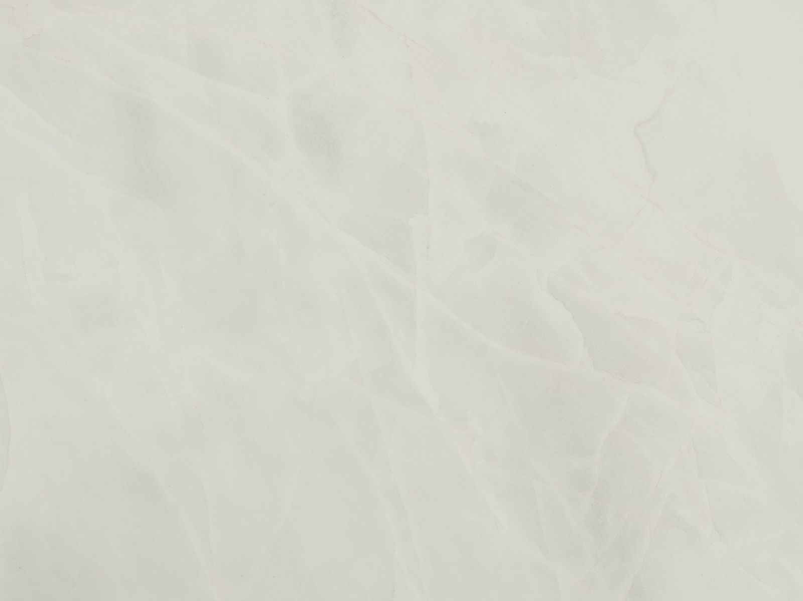 Solid light beige background texture.