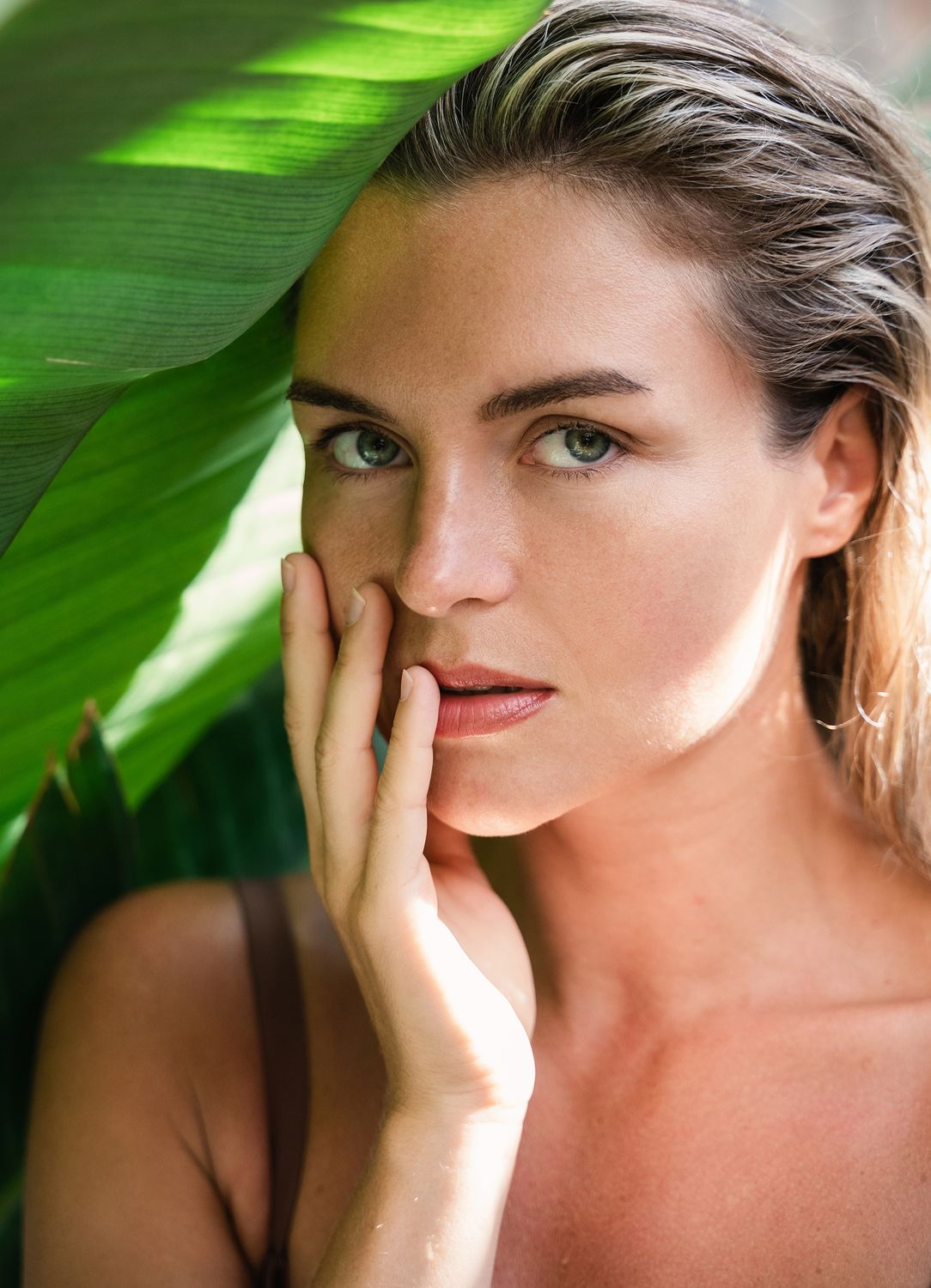 Close-up of a woman’s face with makeup.